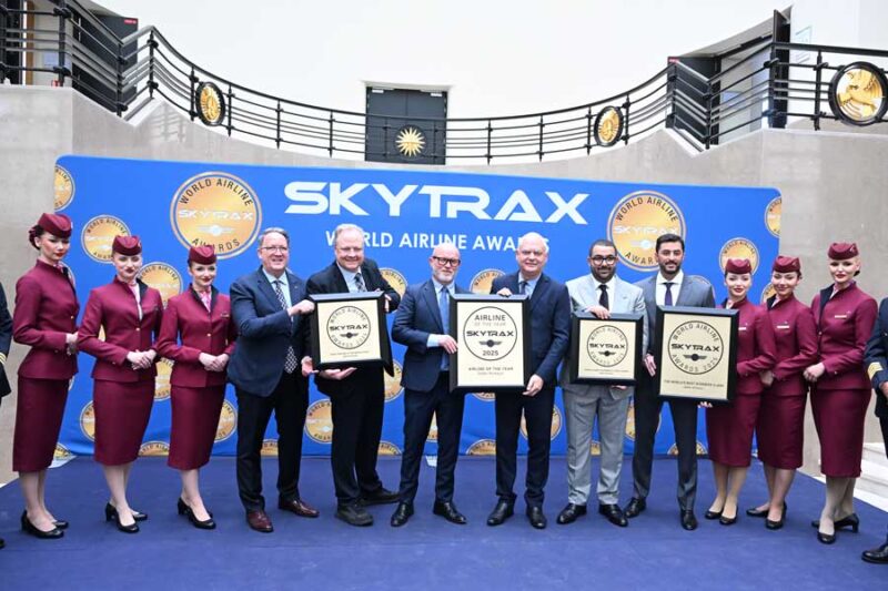 a group of people holding plaques