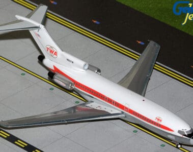 a model airplane on a runway
