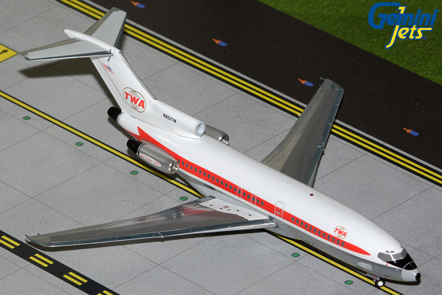a model airplane on a runway
