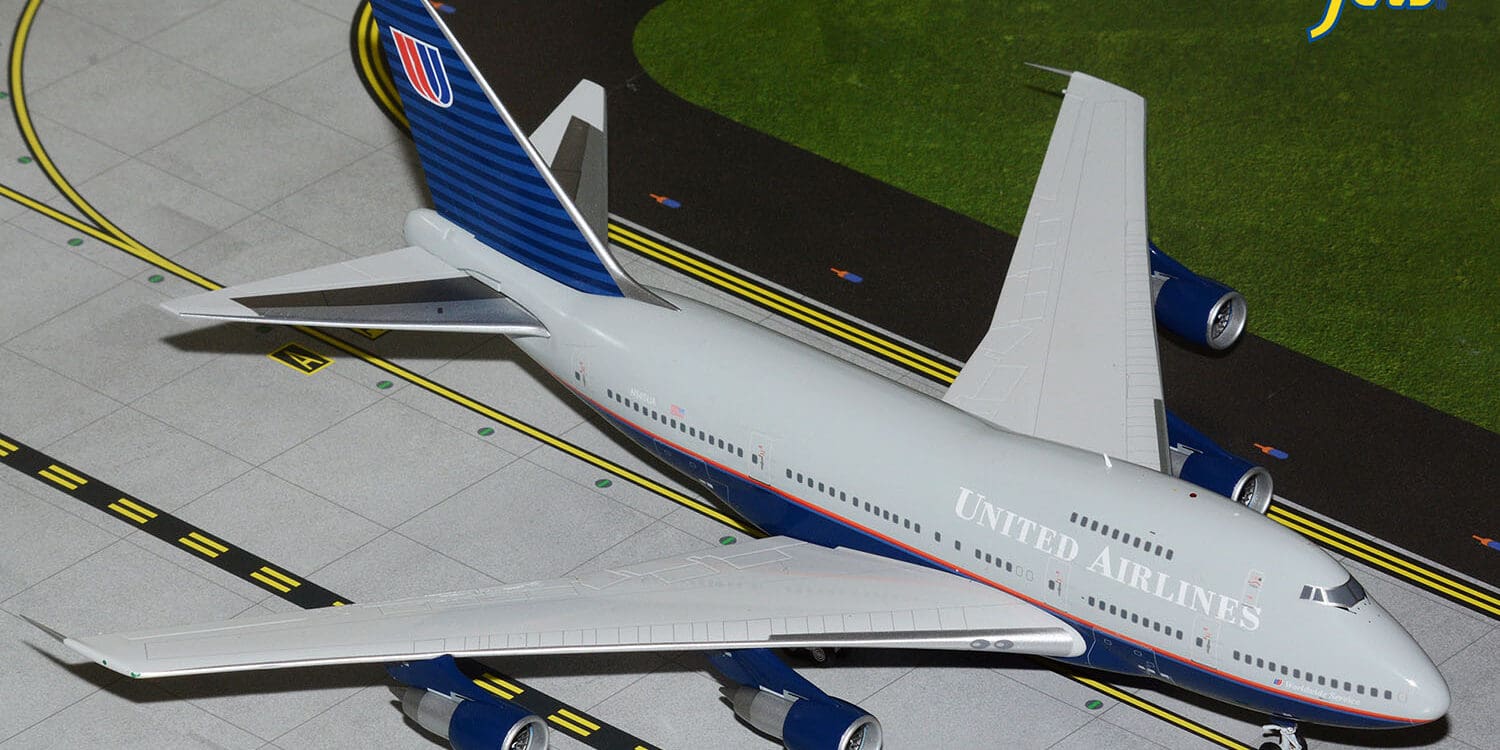 a model airplane on a runway